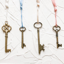 Load image into Gallery viewer, Set of 4 Vintage Skeleton Keys with Tassels for Home Decor, Styling, Photography Props or Flat Lays