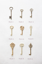 Load image into Gallery viewer, Vintage Gold Skeleton Key with Tassel for Home Decor, Styling, Photography Props or Flat Lays
