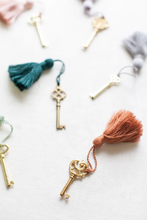 Load image into Gallery viewer, Vintage Gold Skeleton Key with Tassel for Home Decor, Styling, Photography Props or Flat Lays
