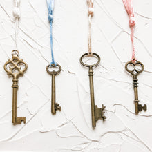 Load image into Gallery viewer, Set of 4 Vintage Skeleton Keys with Tassels for Home Decor, Styling, Photography Props or Flat Lays
