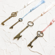 Load image into Gallery viewer, Set of 4 Vintage Skeleton Keys with Tassels for Home Decor, Styling, Photography Props or Flat Lays

