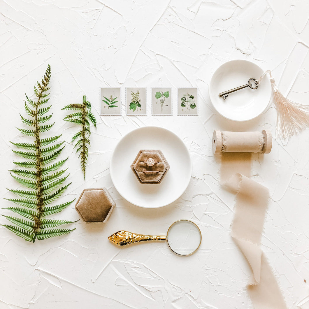 Botanical Flat Lay Styling Kit for Photographers, velvet ring box, gold magnifying glass, vintage stamps, silk ribbon, white trinket dish